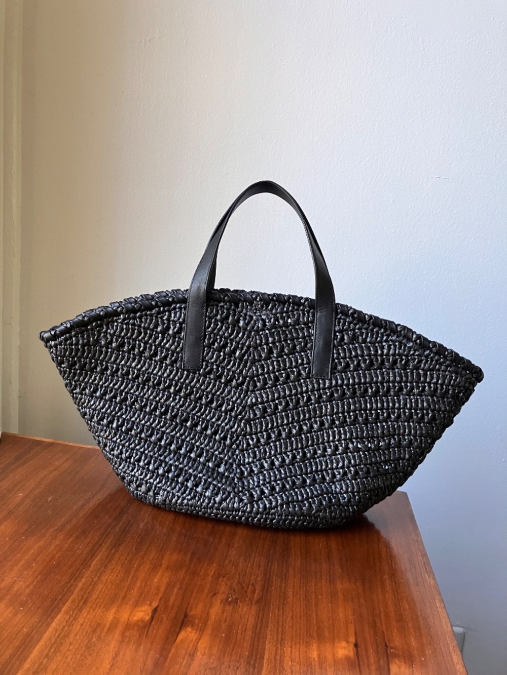 Beautiful handwoven raffia bag with leather details